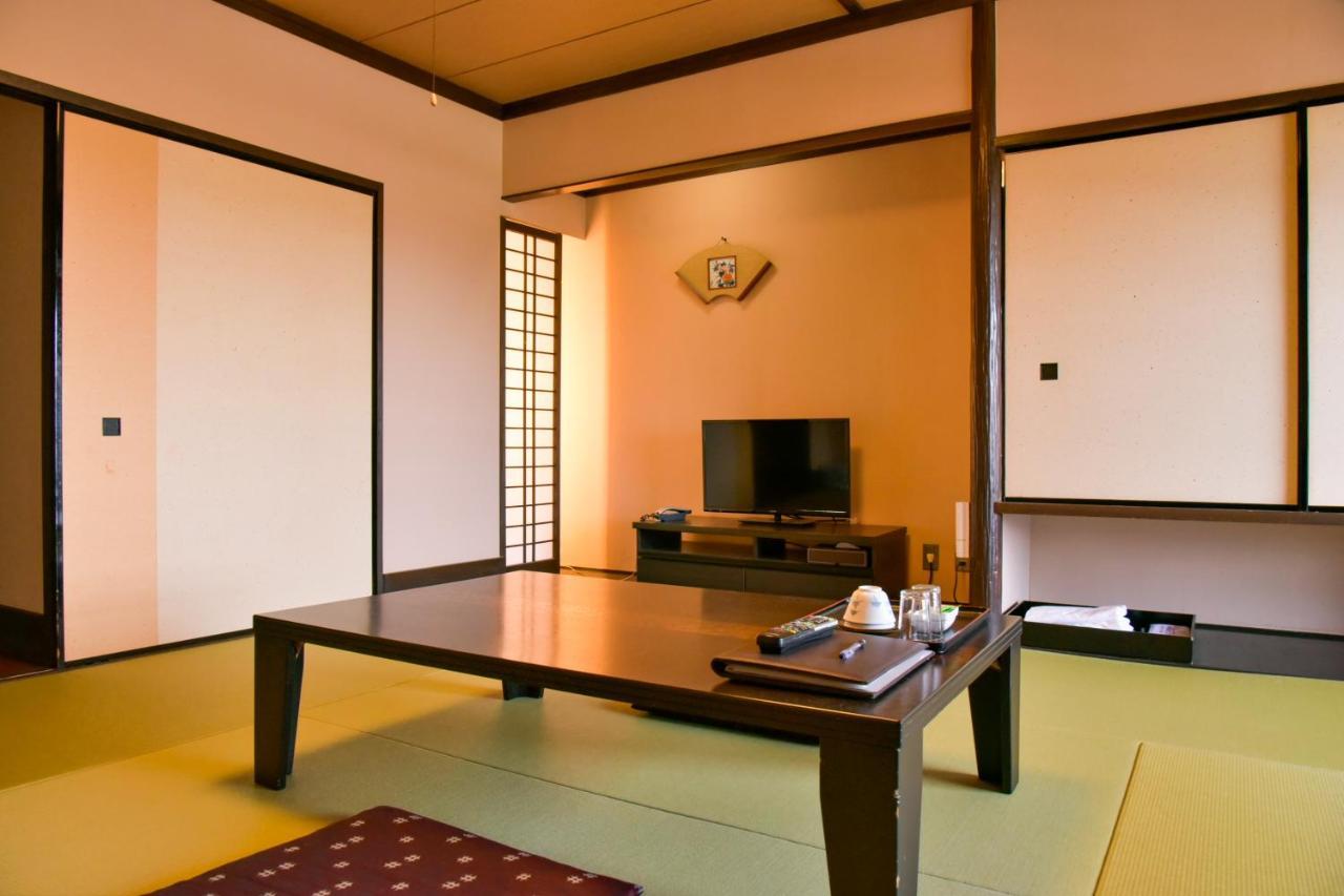 Aso Hotel Buitenkant foto