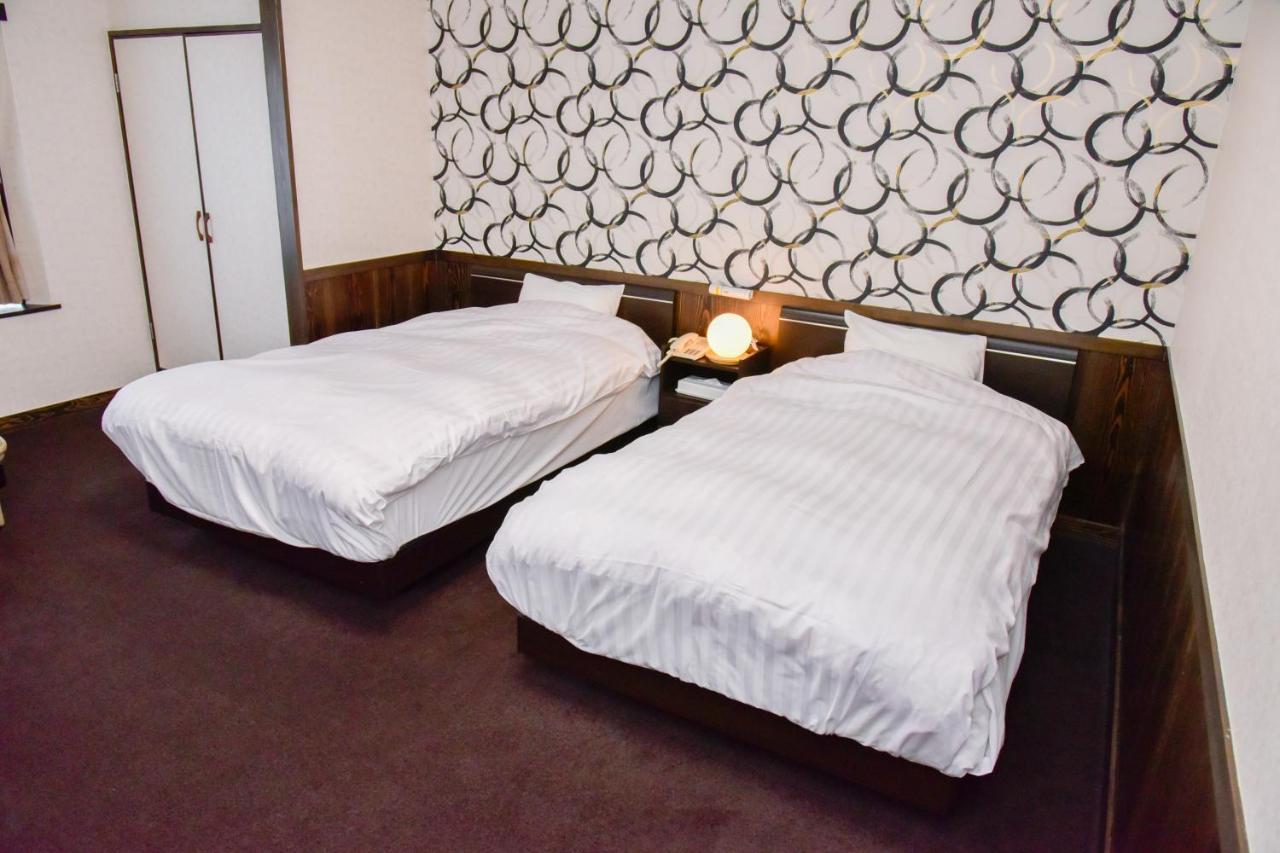 Aso Hotel Buitenkant foto