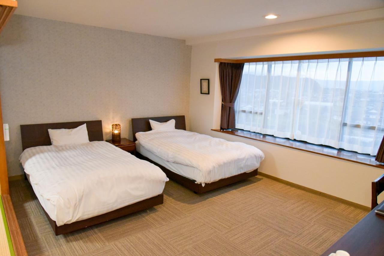 Aso Hotel Buitenkant foto