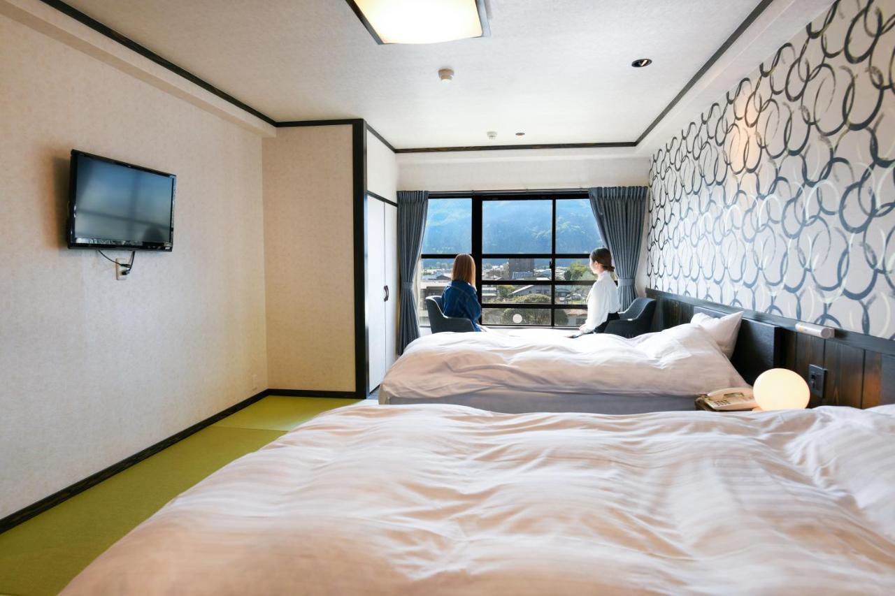Aso Hotel Buitenkant foto