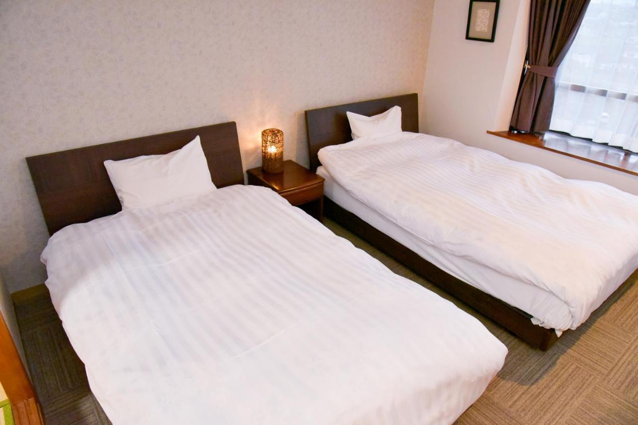 Aso Hotel Buitenkant foto