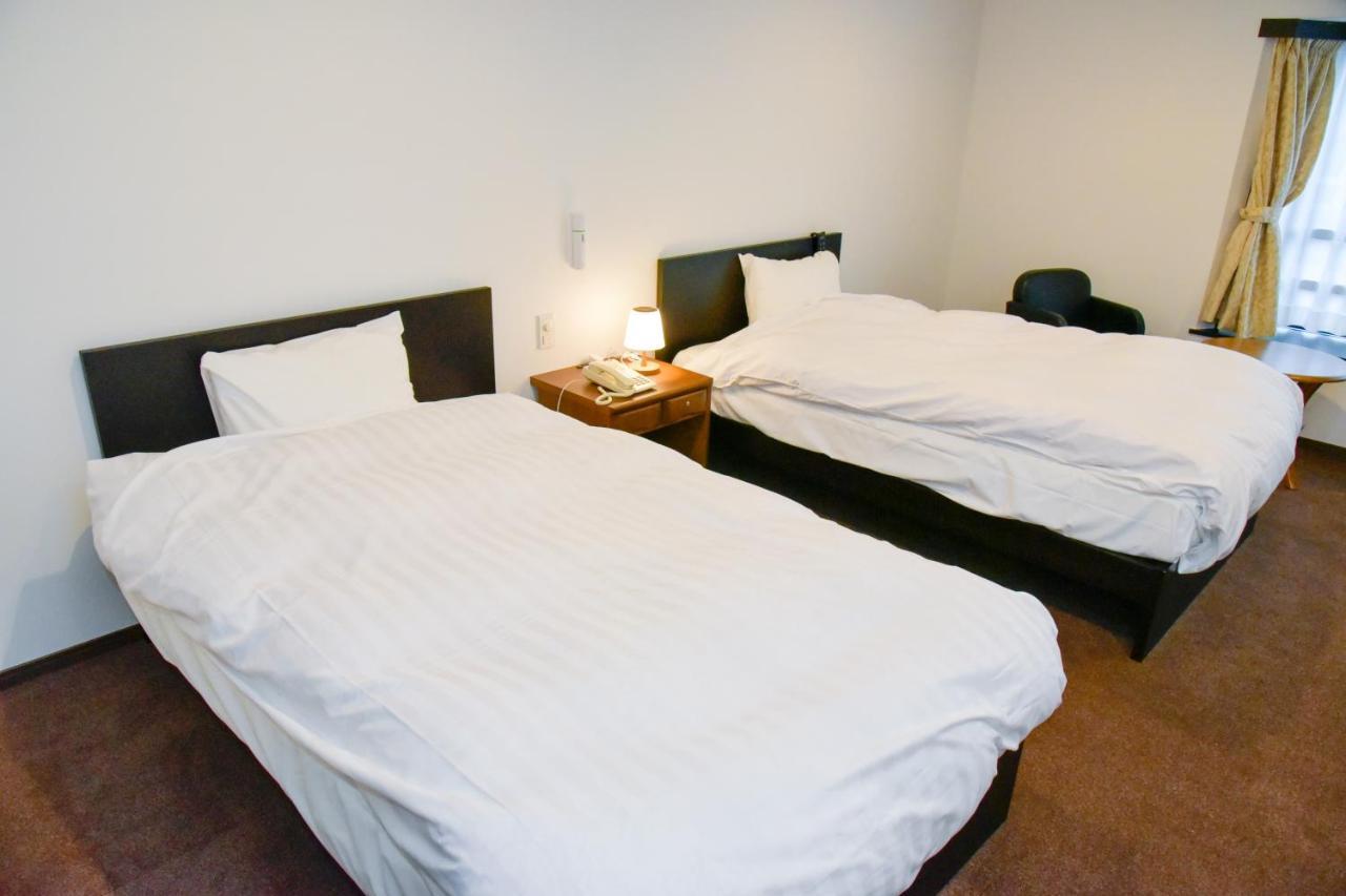 Aso Hotel Buitenkant foto