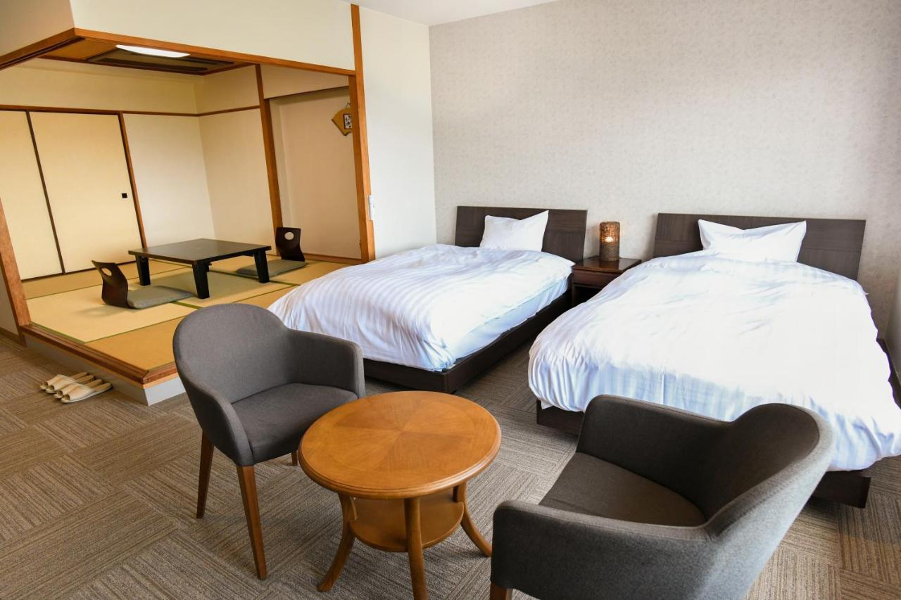 Aso Hotel Buitenkant foto