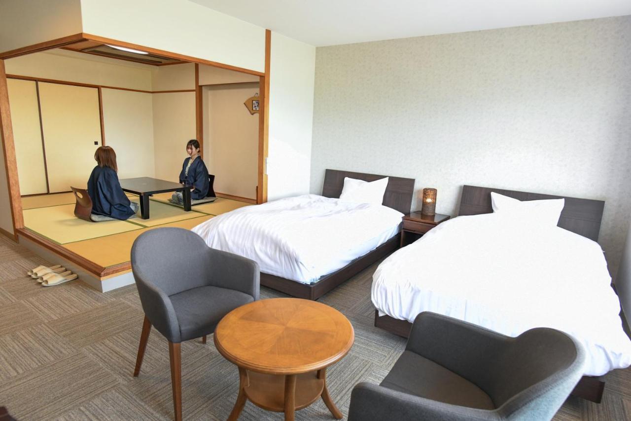 Aso Hotel Buitenkant foto