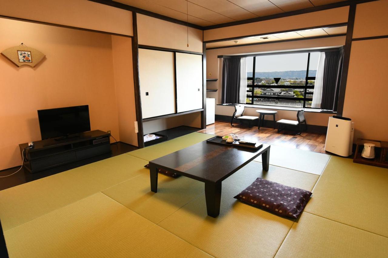 Aso Hotel Buitenkant foto