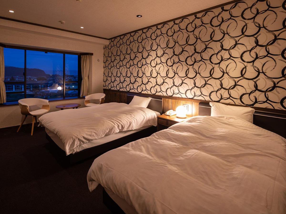Aso Hotel Buitenkant foto