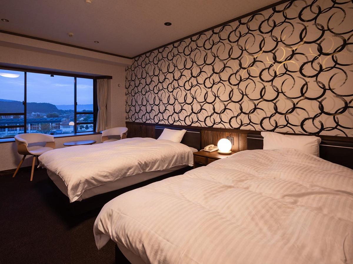 Aso Hotel Buitenkant foto